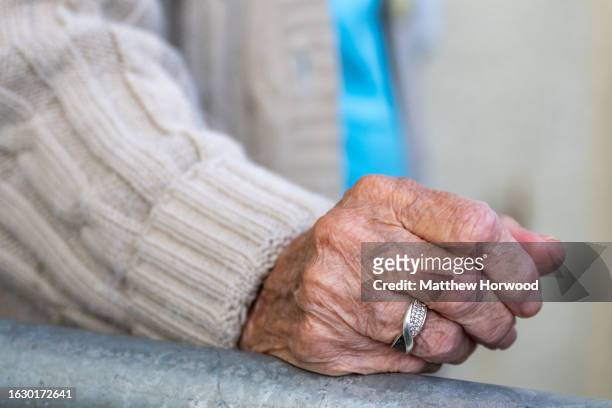 Close-up of the hands of an elderly person on March 18, 2022 in Cardiff, Wales.