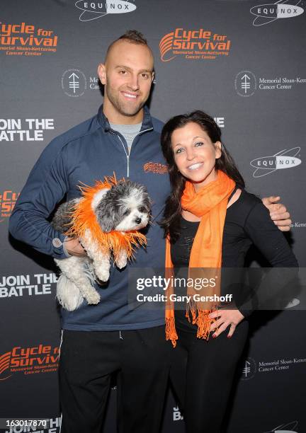 New York Giants linebacker Mark Herzlich holding Baby Hope, and Wendy Diamond attend the 2013 Cycle For Survival Benefit at Equinox Rock Center on...