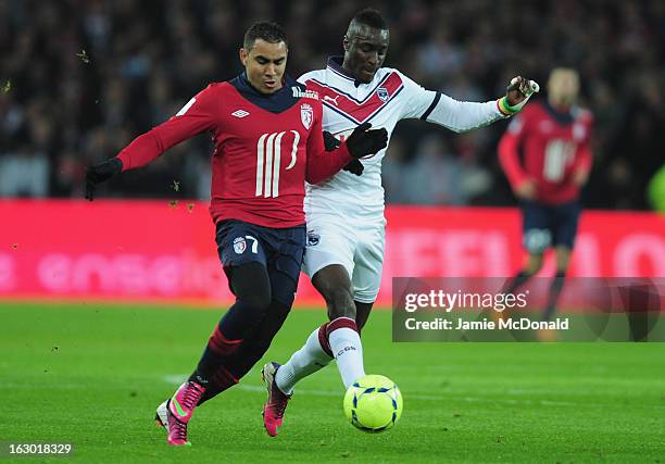 Dimitri Payet of Lille battles with Cheick tidiane Diabate of Bordeaux during the Ligue 1 match between LOSC Lille Metropole v FC Girondins de...