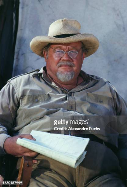 Actor Burl Ives reading the scrip of the film 'The Spiral Road' at Suriname in 1961.