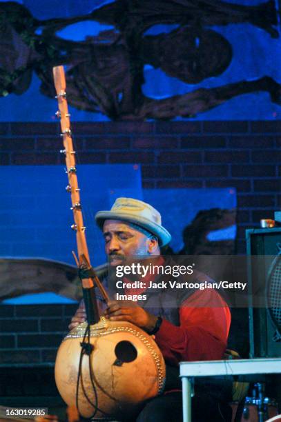 American jazz musician and composer William Parker plays a West African dousongoni at the 8th Annual Vision Festival 'Avant Jazz for Peace' concert...