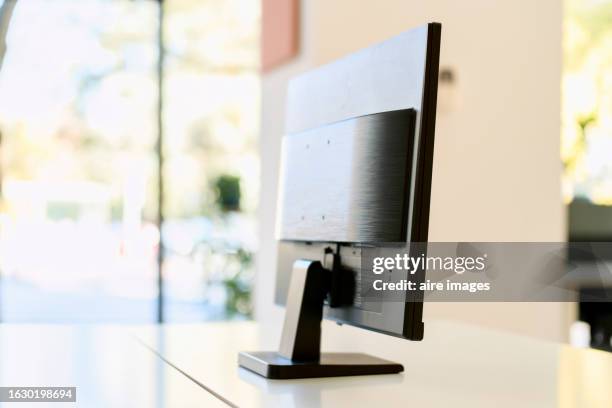 Computer Back Thin Back Of A Black Computer With A Thin Thickness On A Table With An ...