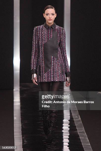 Model walks the runway during the Maxime Simoens Fall/Winter 2013 Ready-to-Wear show as part of Paris Fashion Week on March 3, 2013 in Paris, France.