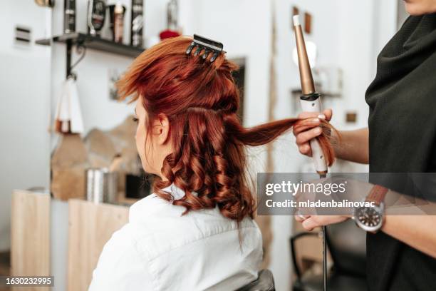 hairdressing treatment at professional beauty salon - brushed back hair stock pictures, royalty-free photos & images