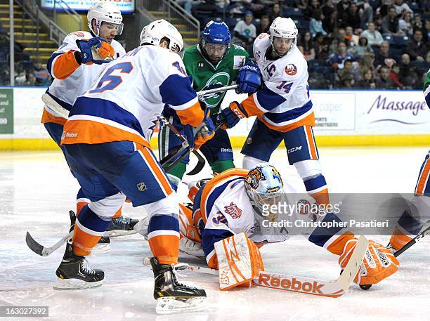 Kenny Reiter of the Bridgeport Sound Tigers makes a save during an American Hockey League game against the Connecticut Whale on March 3, 2013 at the...