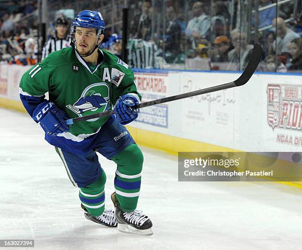 Kris Newbury of the Connecticut Whale skates during an American Hockey League game against the Bridgeport Sound Tigers on March 3, 2013 at the...