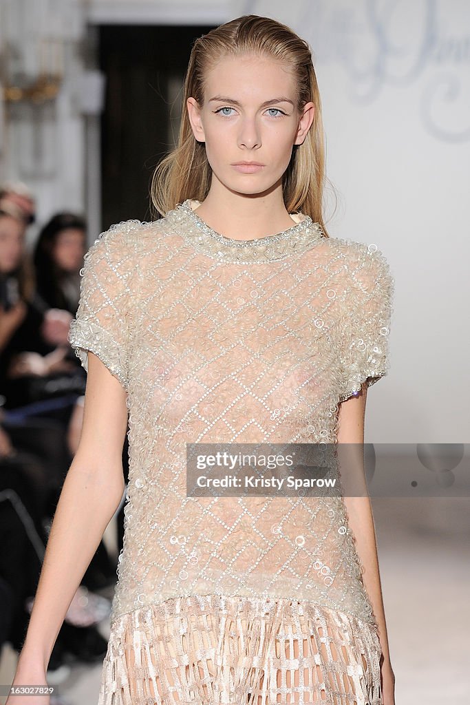 Collette Model A model walks the runway during the Collette Dinnigan 2013/14... News ...