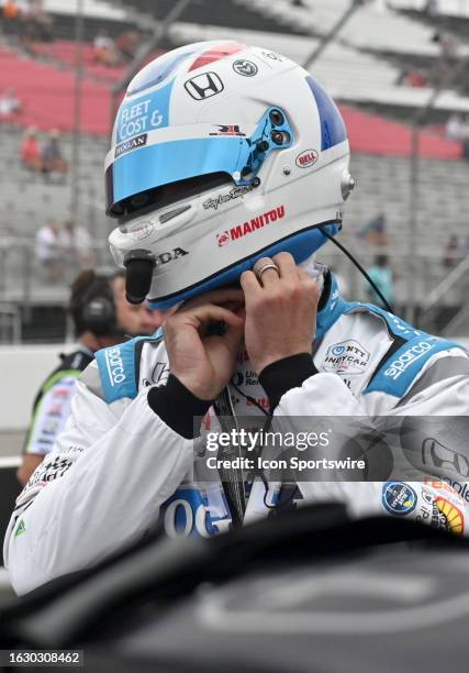 Graham Rahal adjusts his helmet as he gets ready to qualify for the Bommarito Automotive Group 500 IndyCar race on August 27 at World Wide Technology...