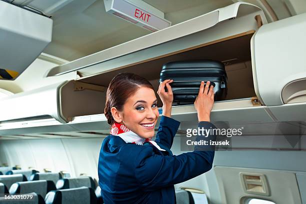 beautiful air stewardess - airhostess stock pictures, royalty-free photos & images