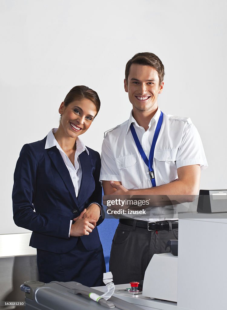 Airline check in attendants at work