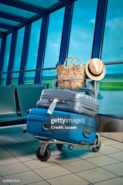 luggage trolley with suitcases - cartgate out stock pictures, royalty-free photos & images