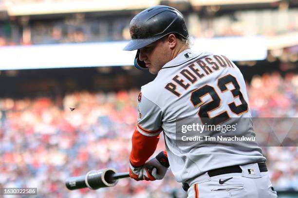 Joc Pederson of the San Francisco Giants warms up during the first inning against the Philadelphia Phillies at Citizens Bank Park on August 21, 2023...
