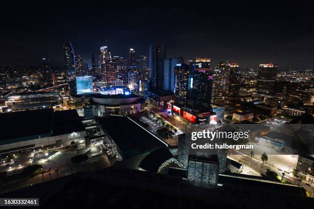 drone shot of la live and south park lit up at night - south park stock pictures, royalty-free photos & images