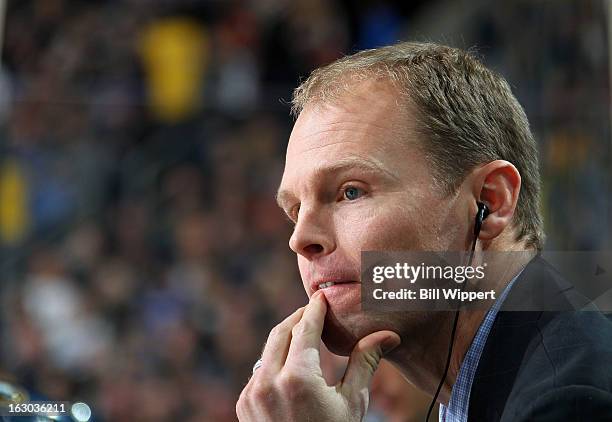 Assistant coach Kevyn Adams of the Buffalo Sabres watches their game against the New York Islanders on February 23, 2013 at the First Niagara Center...