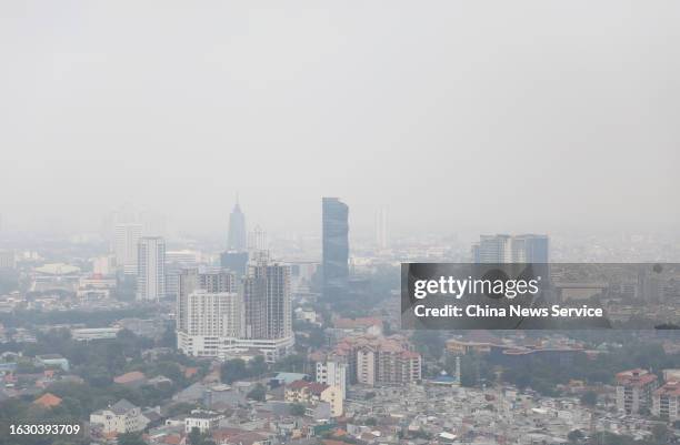 Buildings are shrouded in thick smog on August 21, 2023 in Jakarta, Indonesia.