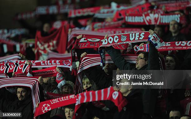 Fans of Lille show there colours during the Ligue 1 match between LOSC Lille Metropole v FC Girondins de Bordeaux at the Grand Stade Lille-Metropole...