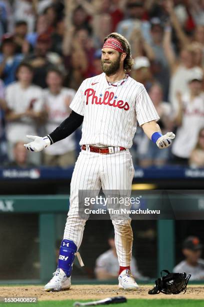 Bryce Harper of the Philadelphia Phillies reacts after hitting an inside the park home run during the fifth inning against the San Francisco Giants...