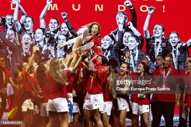 Players hold up to Olga Carmona during the reception of the Spain Women's Team as World Champions after winning the FIFA Women's World Cup Australia...