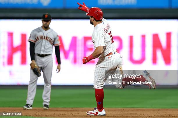 Kyle Schwarber of the Philadelphia Phillies rounds bases after hitting a two run home run during the seventh inning against the San Francisco Giants...
