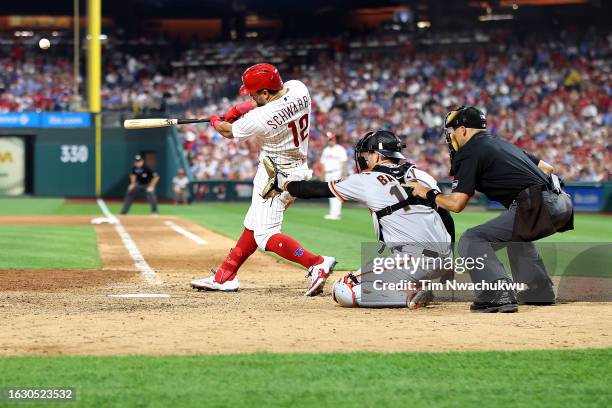 Kyle Schwarber of the Philadelphia Phillies hits a two run home run during the seventh inning against the San Francisco Giants at Citizens Bank Park...