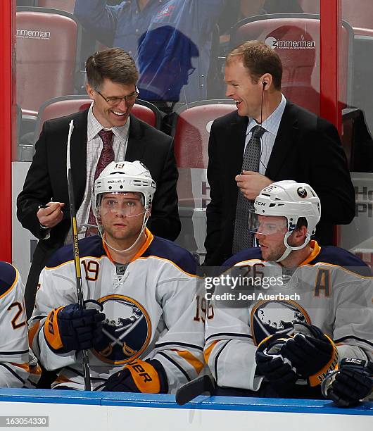 Head coach Ron Rolston and Assistant coach Kevyn Adams of the Buffalo Sabres talk during third period action against the Florida Panthers at the BB&T...