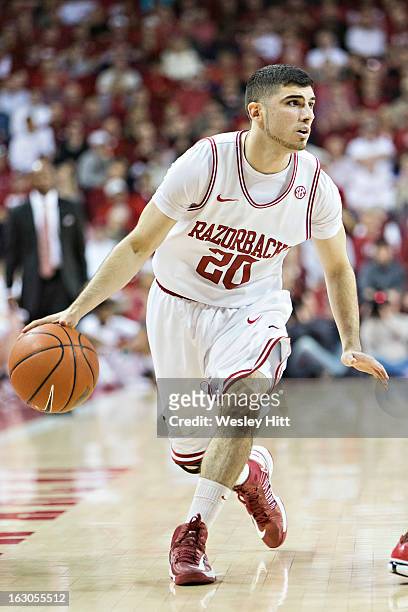 Kikko Haydar of the Arkansas Razorbacks dribbles the ball during a game against the Kentucky Wildcats at Bud Walton Arena on March 2, 2013 in...