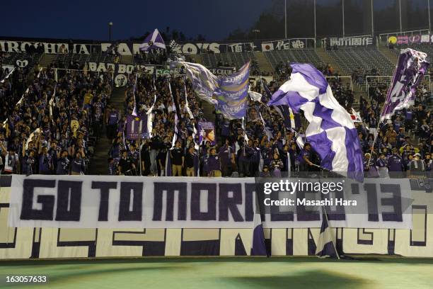 Sunfrecce Hiroshima supporters wave flags prior to the AFC Champions League Group G match between Sanfrecce Hiroshima and Bunyodkor at Hiroshima Big...