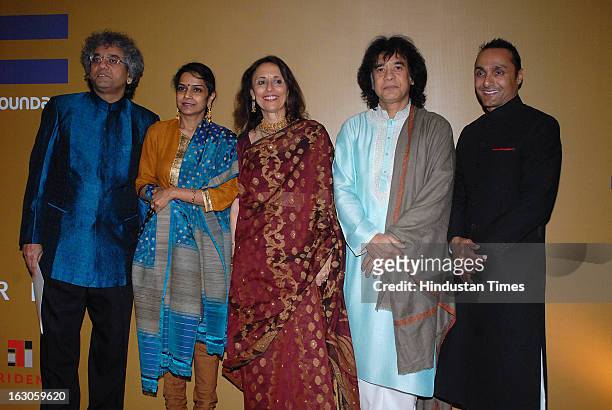 Indian classical musician Taufiq Qureshi with his wife Geetika Varde Qureshi , tabla player and composer Zakir Hussain with his wife Antonia...