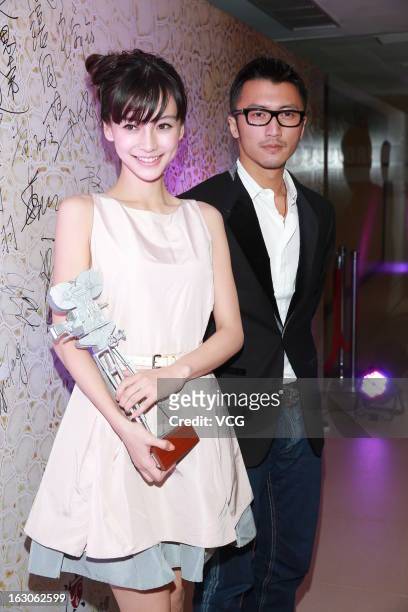 Actress Angelababay and actor Nicholas Tse attend the Federation of Hong Kong Filmmakers spring banquet at Kowloonbay International Trade and...