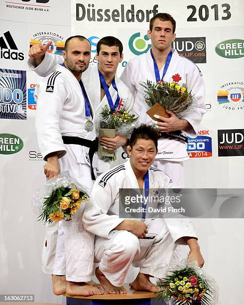 Medal ceremony for the u81kgs category Silver: Levan Tsiklauri GEO, Gold: Avtandil Tchrikishvili GEO, Bronzes: Jae-Bum Kim KOR and Antoine...