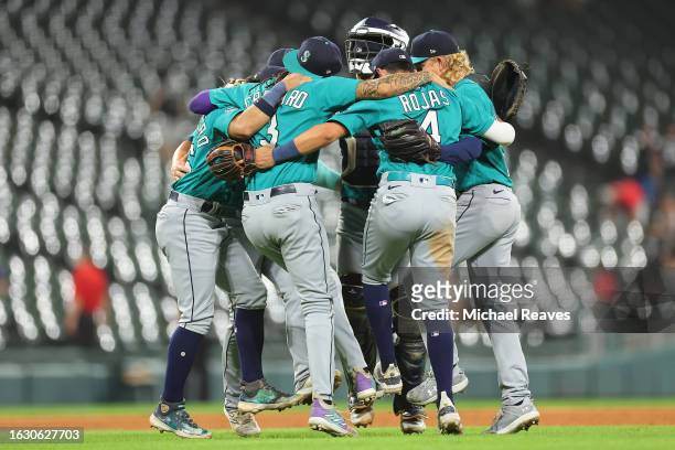 The Seattle Mariners celebrate after defeating the Chicago White Sox 14-2 at Guaranteed Rate Field on August 21, 2023 in Chicago, Illinois.