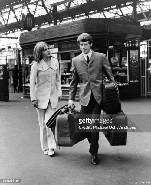 Ingrid Boulting greets Michael Crawford in a scene from the film 'The Jokers', 1967.