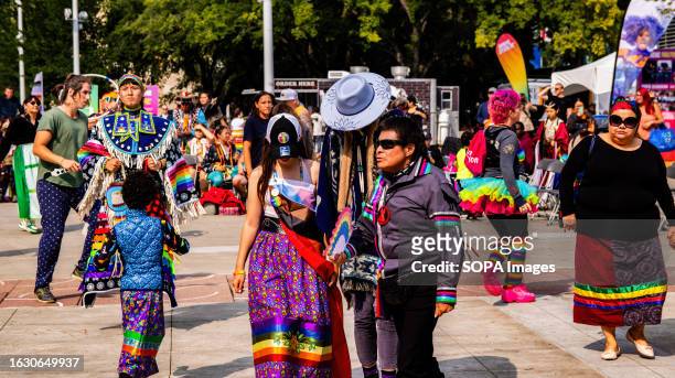 First Nation dancers participate in a traditional round dance during the kick-off of Pride Week and the 2 Spirit Powwow in Edmonton. As Pride weekend...