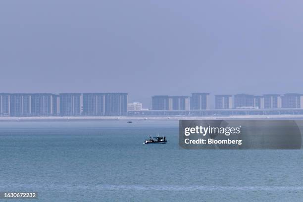 Buildings in Xiamen on the Chinese mainland along the Taiwan Strait off the coast from Kinmen, Taiwan, on Wednesday, Aug. 23, 2023. Kinmen is located...