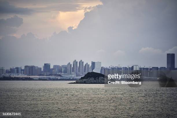 Dadan Island and buildings in Xiamen on the Chinese mainland across the Taiwan Strait from Lieyu Island in Kinmen, Taiwan, on Monday, Aug. 21, 2023....