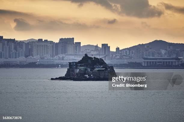 Dadan Island and buildings in Xiamen on the Chinese mainland across the Taiwan Strait from Lieyu Island in Kinmen, Taiwan, on Monday, Aug. 21, 2023....