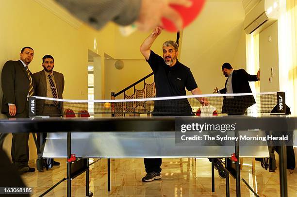 Leader of Hamas Khalid Mishal, plays table tennis with a friend at a private residential gym on February 5, 2013 in Doha, Qatar. .