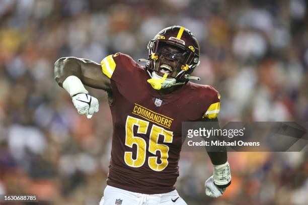 Henry of the Washington Commanders celebrates after making a tackle against the Baltimore Ravens during an NFL preseason game at FedExField on August...