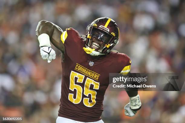 Henry of the Washington Commanders celebrates after making a tackle against the Baltimore Ravens during an NFL preseason game at FedExField on August...