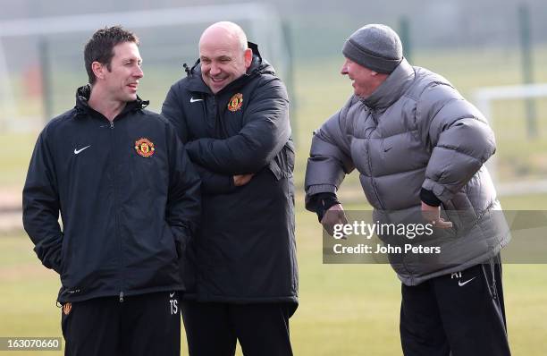 Fitness Coach Tony Strudwick, Assistant Manager Mike Phelan and Manager Sir Alex Ferguson of Manchester United in action during a first team training...