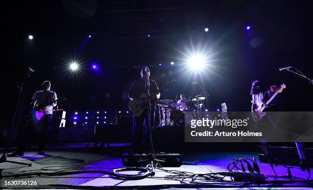 Joey Santiago, Black Francis, David Lovering and Paz Lenchantin of the Pixies perform in concert at Rooftop At Pier 17 on August 21, 2023 in New York...