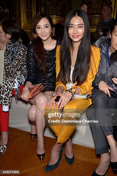 Pace Wu Pei-Ci and Bonnie Chen attend the Stella McCartney Fall/Winter 2013 Ready-to-Wear show as part of Paris Fashion Week on March 4, 2013 in...