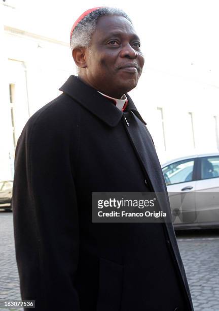 Cardinal Peter Turkson of Ghana arrives at the Paul VI hall for the opening of the Cardinals' Congregations on March 4, 2013 in Vatican City,...
