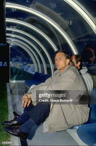 Portrait of Barcelona Manager Johan Cruyff sitting in the dug-out during a match. \ Mandatory Credit: Shaun Botterill/Allsport