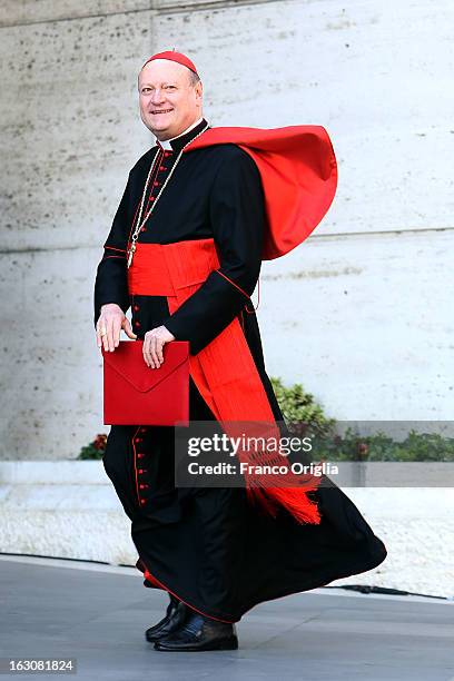 Italian cardinal Gianfranco Ravasi arrives at the Paul VI hall for the opening of the Cardinals' Congregations on March 4, 2013 in Vatican City,...