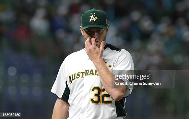 Shane Lindsay of Australia reacts in the sixth inning during the World Baseball Classic First Round Group B match between South Korea and Australia...