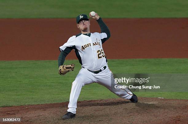 Steven Kent of Australia pitches in the fourth inning during the World Baseball Classic First Round Group B match between South Korea and Australia...