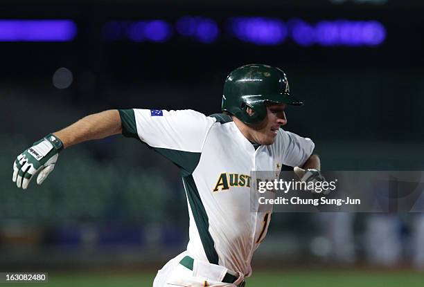 Mitch Dening of Australia run into first base in the sixth inning during the World Baseball Classic First Round Group B match between South Korea and...