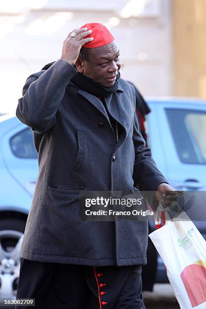 Nigerian cardinal John Olorunfemi Onaiyekan arrives at the Paul VI hall for the opening of the Cardinals' Congregations on March 4, 2013 in Vatican...