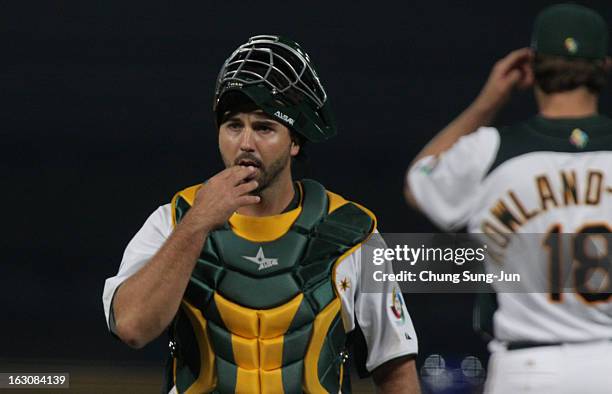 Allan San Miguel of Australia reacts in the eighth inning during the World Baseball Classic First Round Group B match between South Korea and...